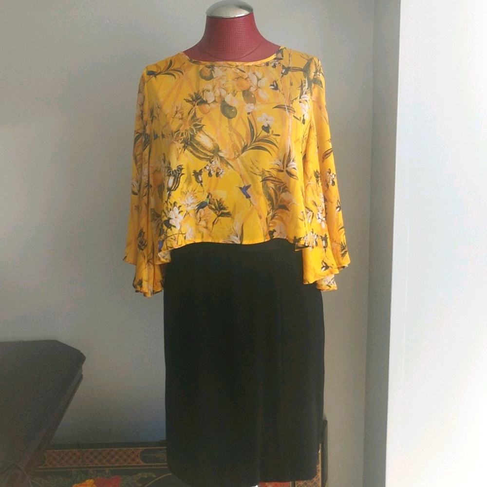 Yellow blouse with batwing sleeves